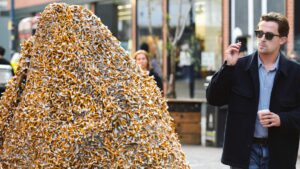 Stunned public come face to face with 6ft high mountain of 225,000 cigarette stubs in busy city centre in new art exhibition | Daily Mail Online