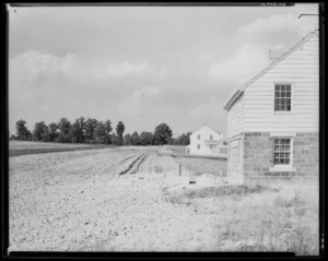 Farmhouse and cultivated land at the Arthurdale project in West Virginia, photographed by Walker Evans in 1935