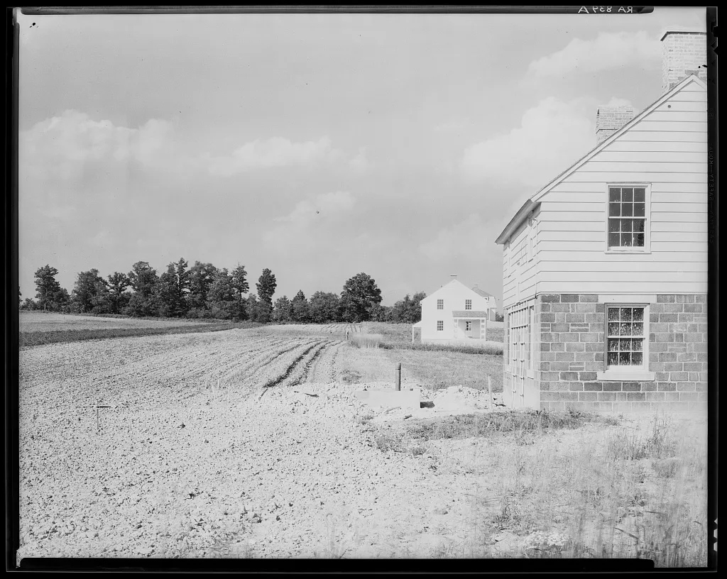 Farmhouse and cultivated land at the Arthurdale project in West Virginia, photographed by Walker Evans in 1935
